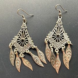 Silver dangly feather earrings